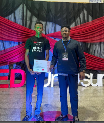 Receiving official TEDx Speaker Certificate at TEDx UniOsun